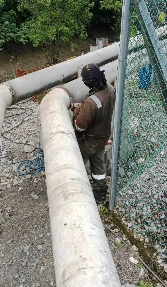 Piping installation and welding works on industrial site